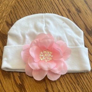 White beanie baby hat with removable velcro pink flower